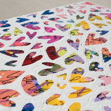 Load image into Gallery viewer, A closeup of a colorful abstract painting painted over with white to show heart designs in the negative colored space.