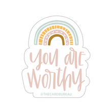 Load image into Gallery viewer, Light pink text "you are worthy" under a 4 stripe rainbow. The inner stripe is a golden brown. The next stripe is light pink with white arrow tip designs. The third stripe is a dashed golden line. The outer stripe is a blue-green line with a thin white line in the middle of it.