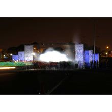 Load image into Gallery viewer, Photo of a stage and audience with smoky glare with night sky in the background