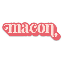 Load image into Gallery viewer, The sticker says "Macon" in light pink in a lower case serif font with ball flourishes on the "m" and the descender of the "n." The word has a angled drop shadow in a darker pink.