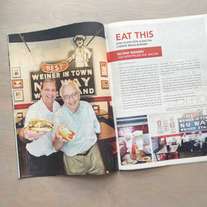 Owners of Nu Way Weiners showing off their favorite treats in a feature spread in 11th Hour magazine