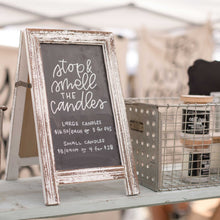 Load image into Gallery viewer, Hand lettered sign that says &quot;stop and smell the candles&quot; with pricing information for purchasing the 7th Street Salvage&#39;s candles.
