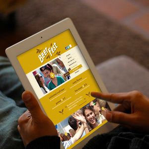Photo of a man's hands holding an ipad on a website entitled "beer fest"