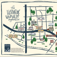 Load image into Gallery viewer, Painted neighborhood map labeled &quot;the historic vineville neighborhood&quot; with black lines and painted buildings and trees.eenery in the background
