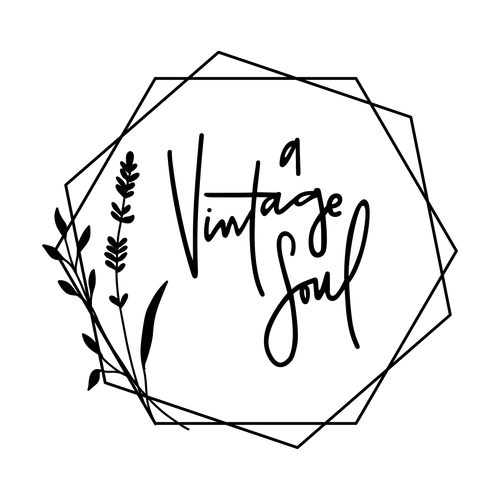 A Vintage Soul's hand lettered and hand drawn logo. The typography is a messy cursive and is surrounded by geometric hexagons and a lavender sprig all in black.