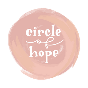 A circle of shades of pink with white lettering inside. The lettering says "circle of hope" where "circle" and "hope" are a hand drawn serif typography and "of" is a cursive monoline typography.