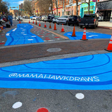 Load image into Gallery viewer, Shot of completed crosswalk mural with @mamahawkdraws painted in foreground
