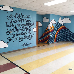 Full view of the "you'll move mountains" mural
