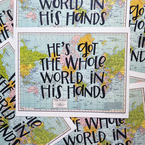 Collage of multi-colored vintage style maps of the world with hand-lettered text that says 